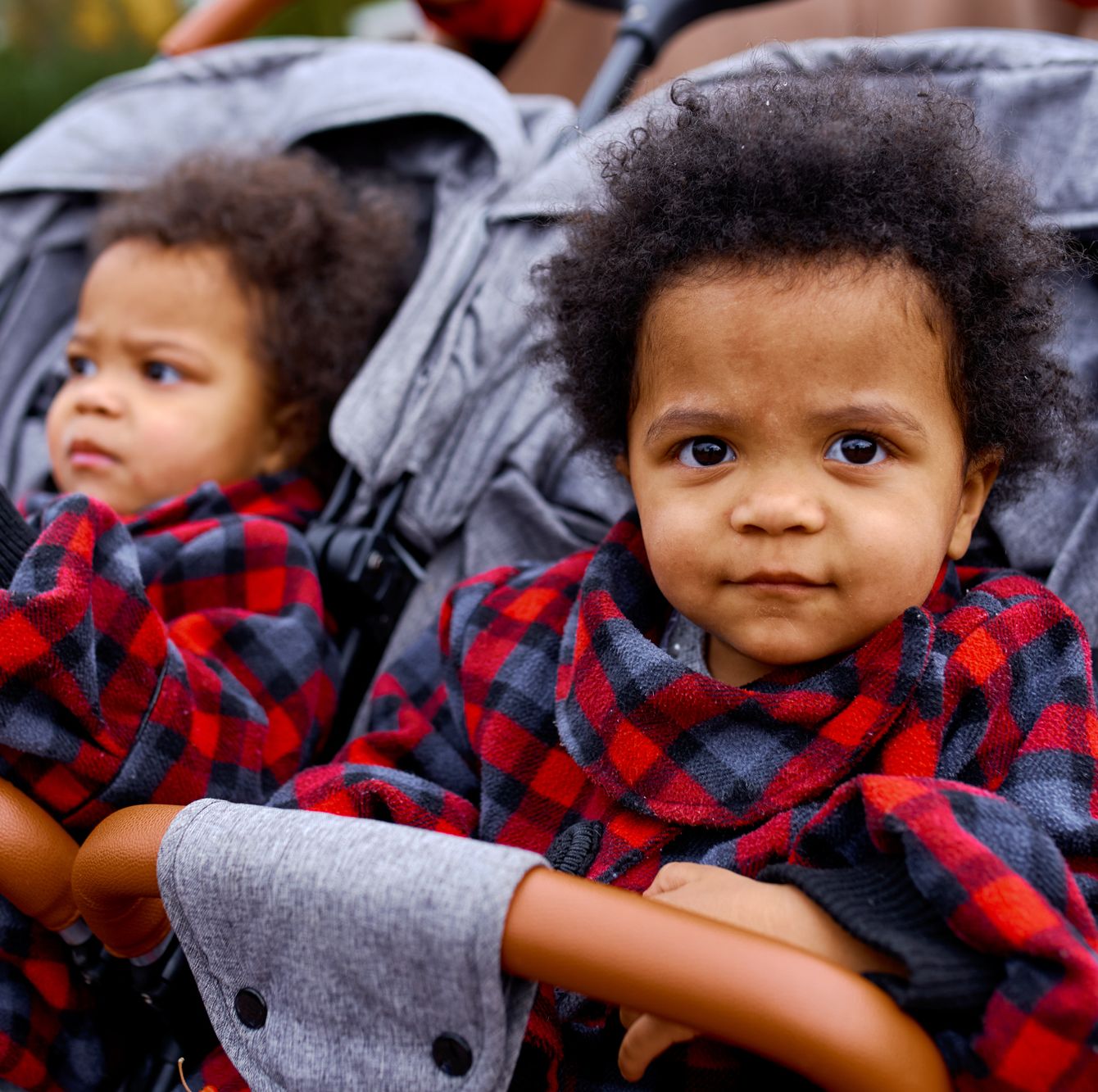 twins in double stroller